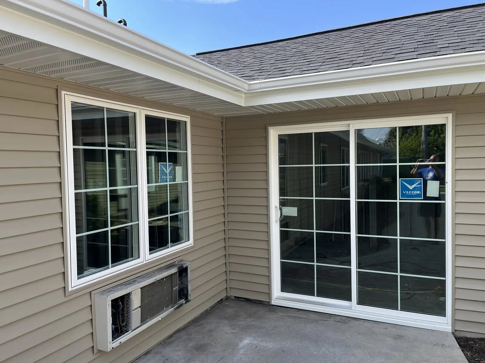 Restored siding, windows, soffit, and trim